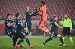 包含匈牙利国家队在与格鲁吉亚队的比赛中成功晋级的词条